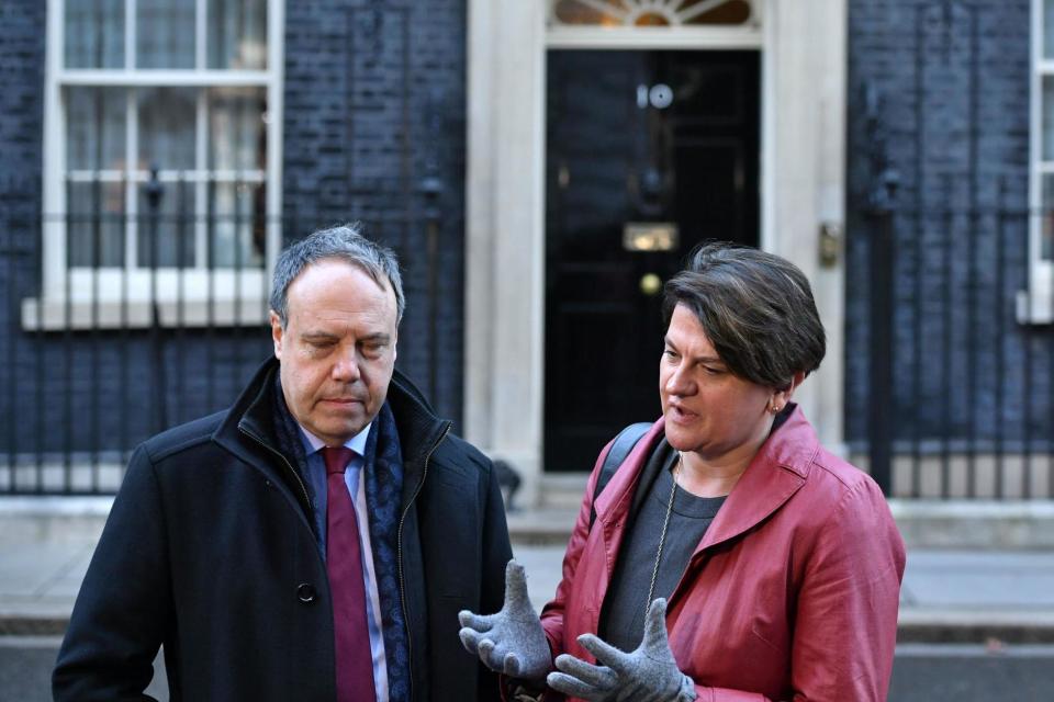 DUP leader Arlene Foster, right, and the party's deputy leader Nigel Dodds (PA)