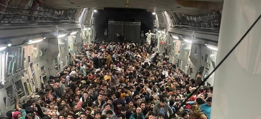 More than 600 Afghans squeeze onto a US evacuation flight out of Kabul on Sunday, 15 August, 2021 (Courtesy of US Defense Department via Defense One)