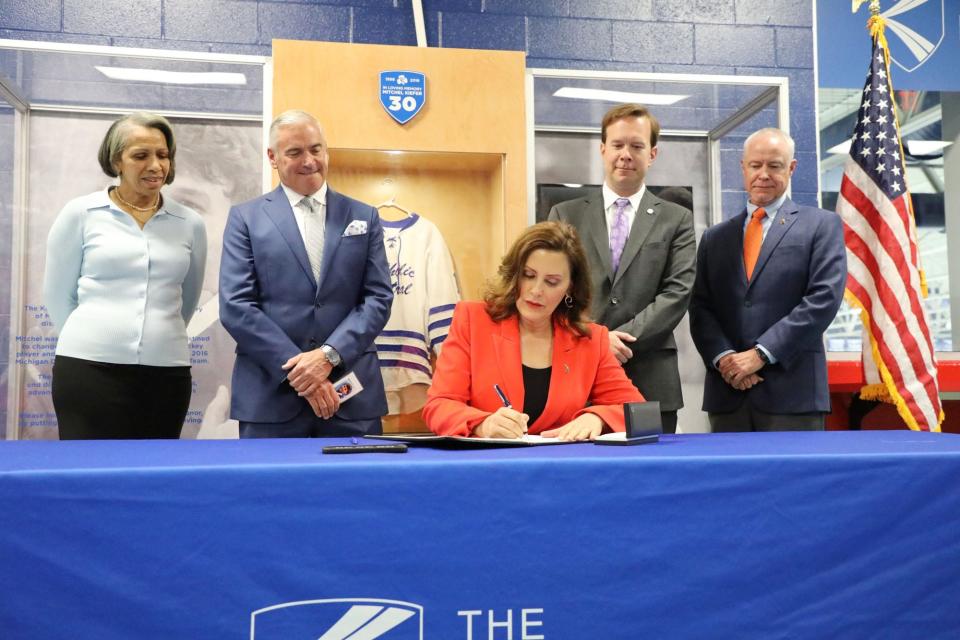 Lisa Lunsford (Board-Chair, MICHauto. Co-founder and CCEO of GS3 Global), left, Steve Kiefer (Founder and Chairman, Kiefer Foundation. Fmr. President, GM International), Gov. Gretchen Whitmer, state Rep. Matt Koleszar (bill sponsor), Brad Wieferich (Director, MDOT) as Whitmer joined state officials and anti-distracted driving leaders to sign three bills aimed at reducing distracted driving and saving lives by ensuring that drivers have their full attention on the road with the use of hands-free technology.