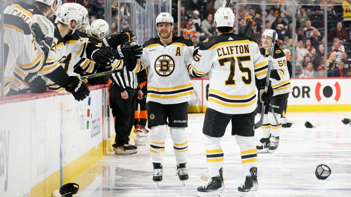 Bruins beat Devils 2-1, match NHL record with 62nd win - The San Diego  Union-Tribune