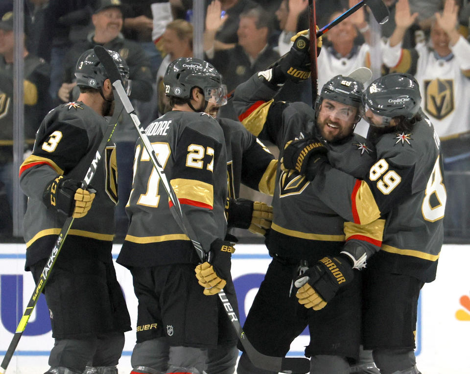 LAS VEGAS, NEVADA - JUNE 10:  The Vegas Golden Knights celebrate a third-period goal by William Carrier (2nd R) #28 against the Colorado Avalanche in Game Six of the Second Round of the 2021 Stanley Cup Playoffs at T-Mobile Arena on June 10, 2021 in Las Vegas, Nevada. The Golden Knights defeated the Avalanche 6-3 to win the series.  (Photo by Ethan Miller/Getty Images)