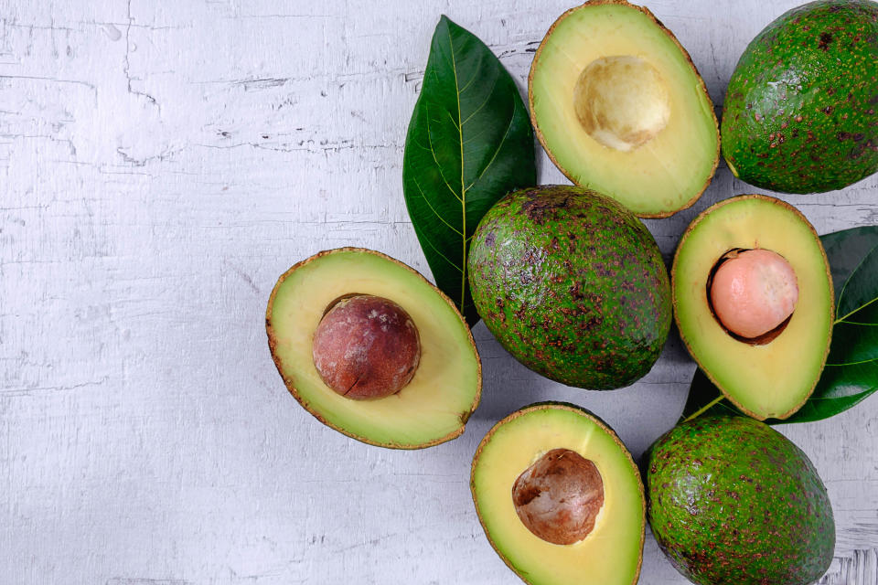 A close-up of avocados cut open