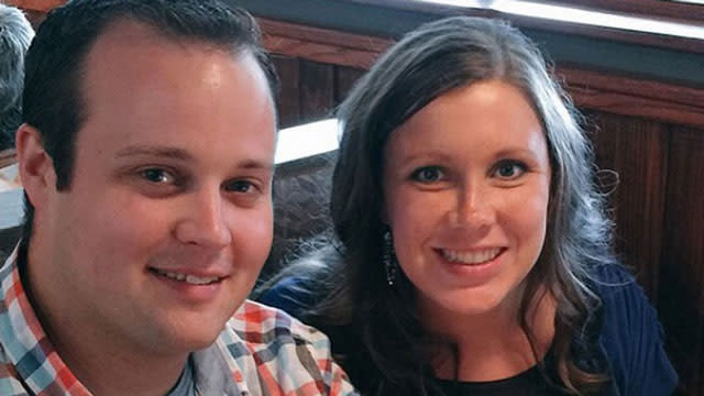 Sunday must have been a difficult day for Anna Duggar. The mother of four brought her children and accompanied her in-laws first to their 11 a.m. church service in Arkansas, then to her cousin-in-law Amy's nearby wedding to Dillon King that evening. Both events had heavy connections to Anna. <strong>WATCH: Duggar Family Bracing for More Josh Bombshells</strong> First, at Cross Church, Pastor Jeff Crawford gave his congregation what one eyewitness described as a "fiery" sermon about pornography, which Crawford called a "secret sin.” Anna's husband, Josh Duggar, confessed in a statement released last month to being unfaithful to his wife and becoming addicted to “viewing pornography on the Internet,” a revelation that has since been removed. Anna was in the crowd listening as Crawford said, "I know there are some folks in here today -- pornography is a deal in your life." Josh, who is seemingly still in treatment for sex addiction, wasn't there Sunday, leaving Anna to look after their young children on her own, albeit with help from extended family. She wore a blue shirt and a long khaki-colored skirt, and greeted fellow churchgoers with a smile. Anna even posed for a family photo up front after the service. The Duggars were the last to leave the church, piling into a van and heading back in the direction of their home in Tontitown. ETONLINE As for rumors that Anna is holed up in a mountain home, a source close to the family tells ET that's likely not the case right now. "I don't know for sure because the family is staying so quiet," the source says. "But she's probably with Jim Bob and Michelle." Anna's in-laws publicly declared their support for her as Josh entered treatment. <strong>WATCH: Could Anna Duggar Ever Leave Josh After Cheating Admission?</strong> Anna still seemed upbeat as guests gathered for Amy Duggar's wedding at Horton Farms Sunday evening. She chatted with family and took a seat with them, but as the ceremony began, her happy energy seemed to fade. The man who married Amy and Dillon told the pair to be "open, honest and faithful" in marriage. He advised that they go "all in" for both each other and Jesus. He told the newlyweds marriage is about being "only with each other for the rest of your lives." "Anna definitely looked somber during the ceremony," an eyewitness tells ET. "She was watching and listening, and she just looked kind of sad." The former reality star ducked out quickly after -- she wasn't seen at the reception. "Bless her heart," a source close to the Duggar family says. "She tried to put a smile on, but what it must have been like for her to be at a wedding…" According to sources, Josh is in a treatment center in Rockford, Illinois. Anna has not spoken publicly since his cheating scandal broke.