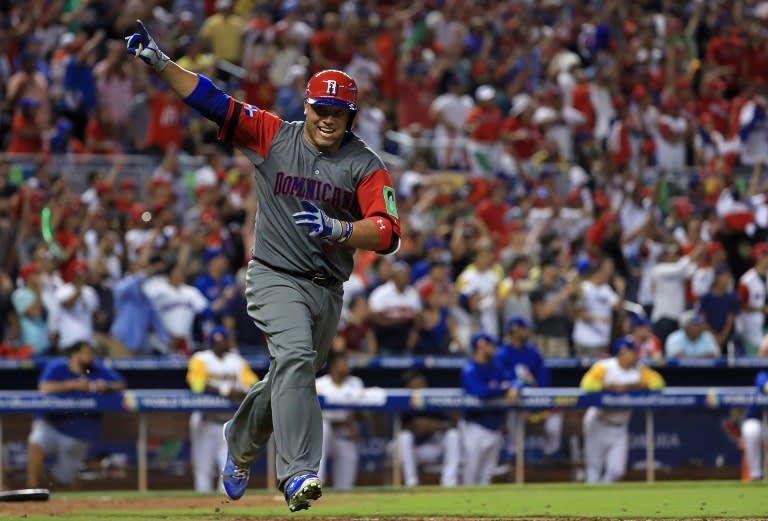 Welington Castillo of the Dominican Republic hits a 2 run single in the 11th inning during a Pool C game of the 2017 World Baseball Classic against Colombia at Miami Marlins Stadium on March 12, 2017