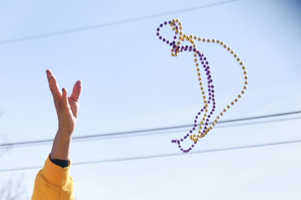 People on floats throw beads during parades to mimic a king throwing jewels to his supporters, according to the Almanac. Purple, yellow and green, the traditional colors of Mardi Gras, represent justice, power and faith.