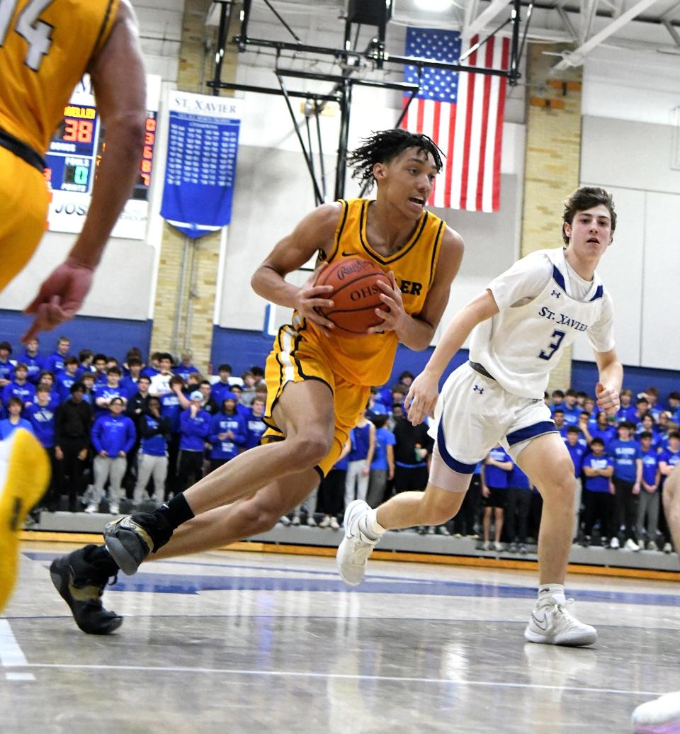 Moeller's Alex Kazanecki finished with 13 points and five rebounds as the Crusaders beat Elder to clinch the Greater Catholic League-South title.