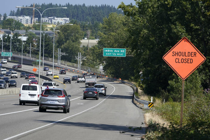 The eastbound lanes of Highway 520 are shown near the exit for 148th Ave. NE, Wednesday, July 14, 2021, in Redmond, Wash. Police said Wednesday that they were investigating a hit-and-run crash in the same area of the highway that could be tied to former Seattle Seahawks and San Francisco 49ers NFL football star Richard Sherman. Sherman is suspected of leaving his damaged car after the crash in the early morning hours and trying to force his way into a family member's home before he was arrested and booked into jail. (AP Photo/Ted S. Warren)