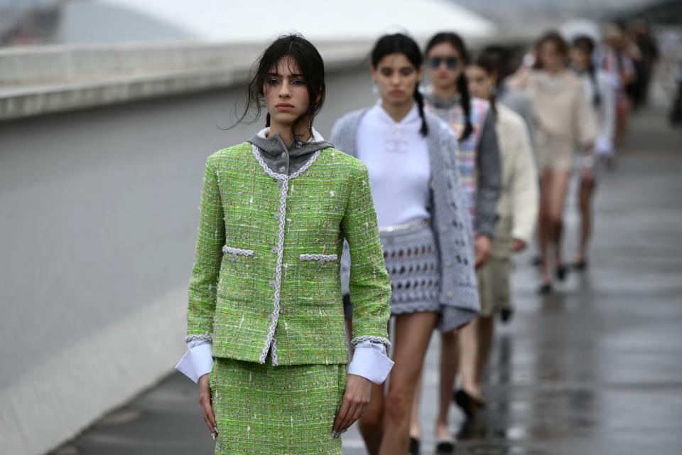 A model presents a creation by Chanel for the 'Croisiere' show, on the roof of the Cite Radieuse building in Marseille, France, on May 2, 2024.