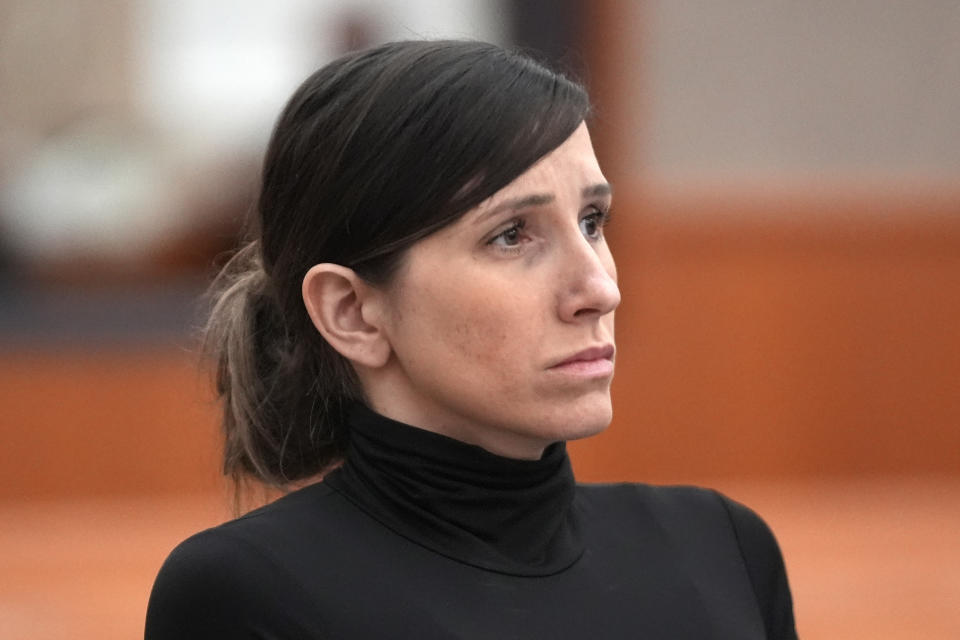 Kouri Richins, a Utah mother of three, who wrote a children's book about coping with grief after her husband's death and was later accused of fatally poisoning him, looks on during a hearing Wednesday, May 15, 2024, in Park City, Utah. (AP Photo/Rick Bowmer, Pool)