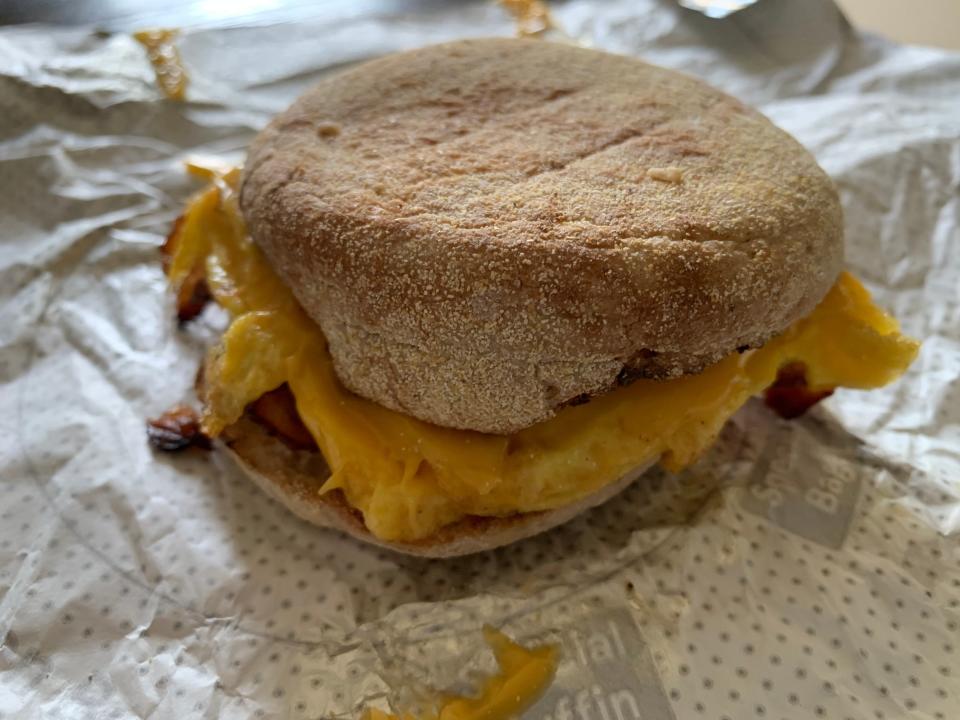 Chick-fil-A bacon, egg, and cheese muffin on white wrapper