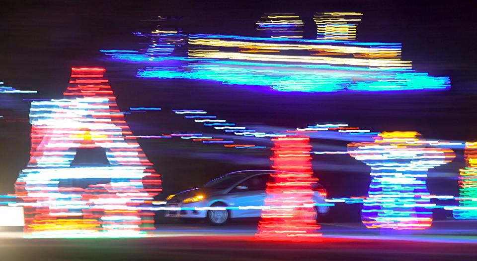 Cars drive through during the annual Anderson Lights of Hope displays off of Martin Luther King Jr Blvd across from the Civic Center of Anderson, in Anderson, S.C. The annual month-long drive through lights display which benefits local charities, from 5:30 p.m. to 10 p.m. through Christmas.