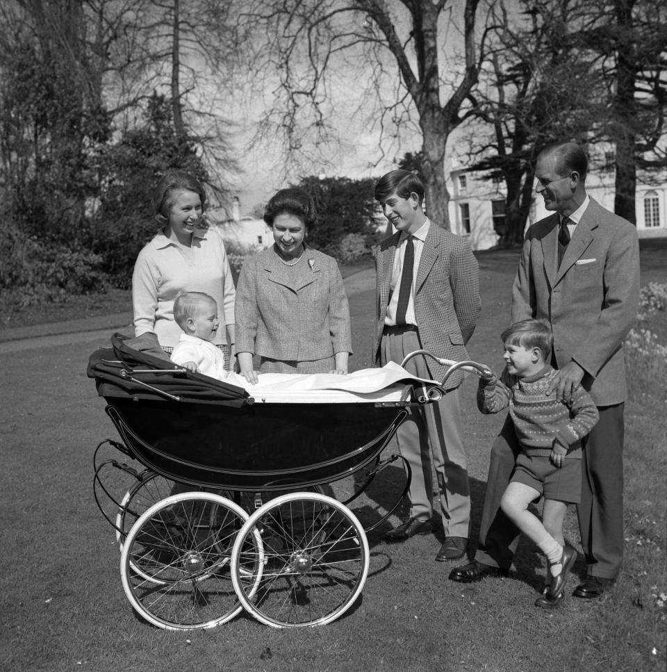 Princess Anne, Prince Edward, Queen Elizabeth II, Prince Charles, Prince Andrew, and Prince Philip on the lawn at Frogmore House in Windsor on April 20, 1965.