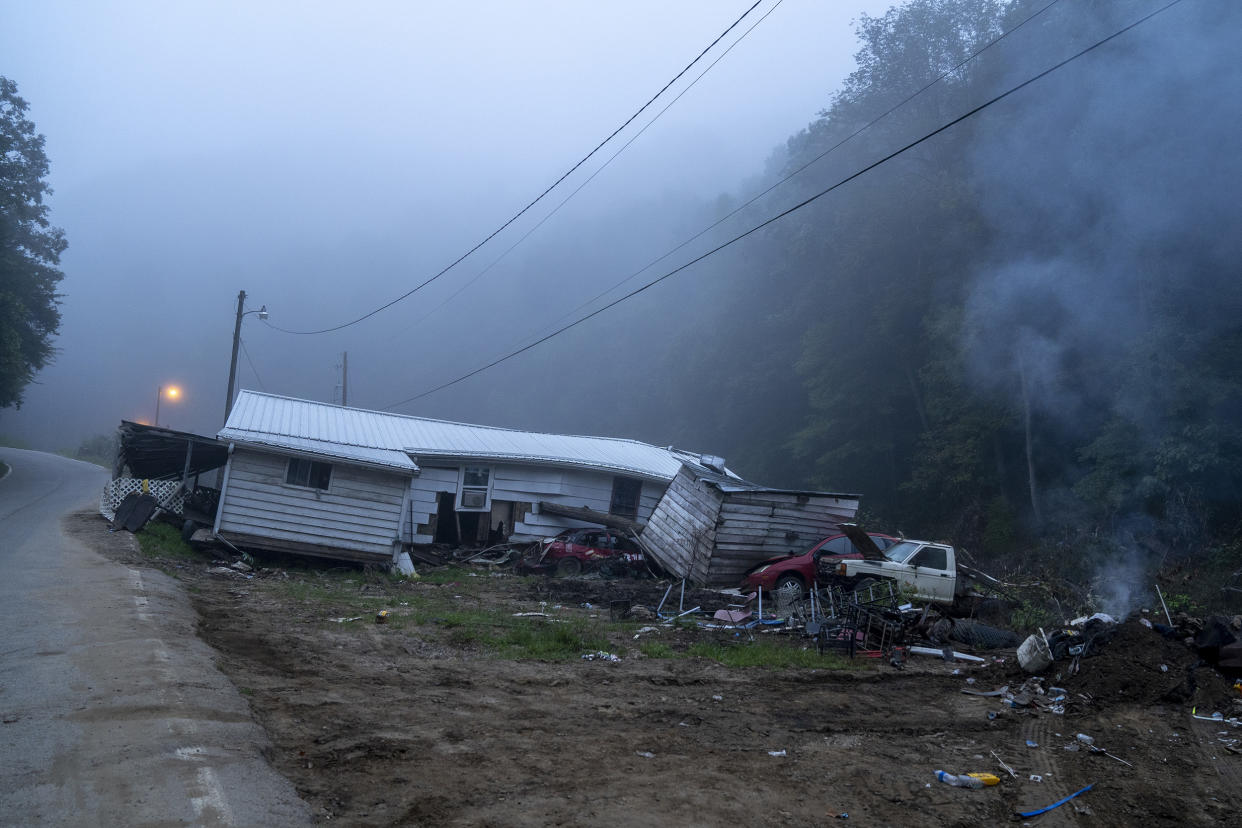 Image: A house sits on the edge of the road after it was swept from its foundation in Lost Creek, Ky., on Aug. 18, 2022. (Michael Swensen for NBC News)