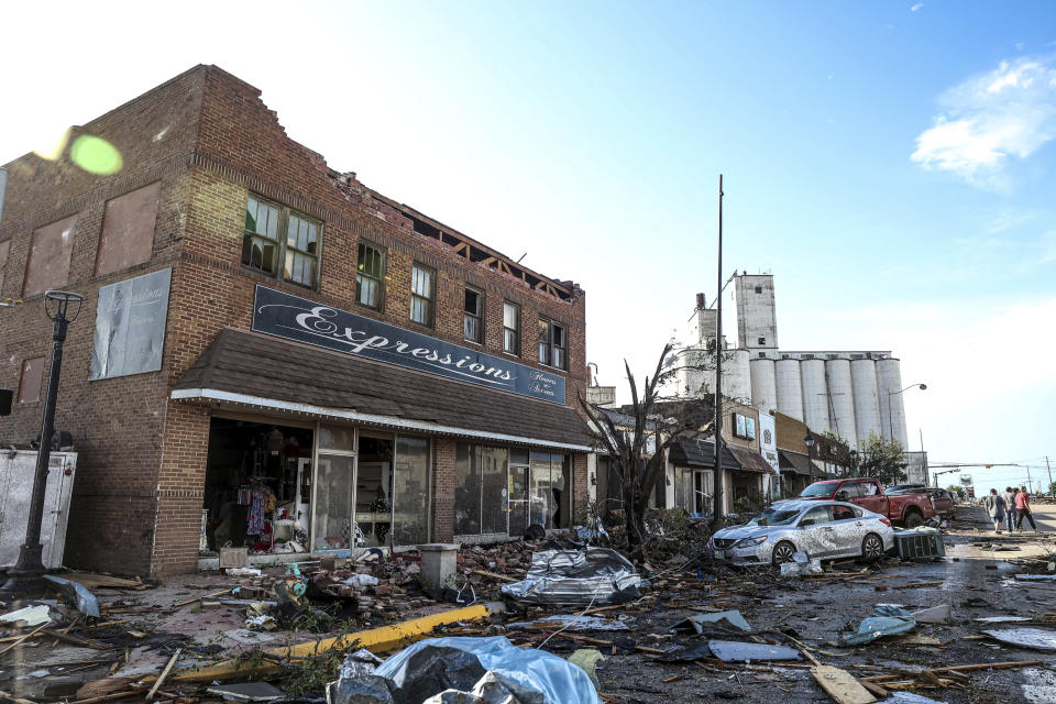 Buildings and vehicles show damage after a tornado struck Perryton, Texas.