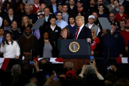 U.S. President Donald Trump delivers remarks at the American Center for Mobility for American Manufactured Vehicles in Ypsilanti Township, Michigan, U.S. March 15, 2017. REUTERS/Jonathan Ernst