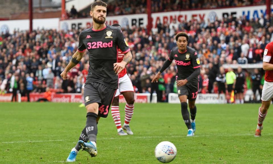 Mateusz Klich strokes home a penalty for Leeds United’s second  goal in the win at Barnsley.