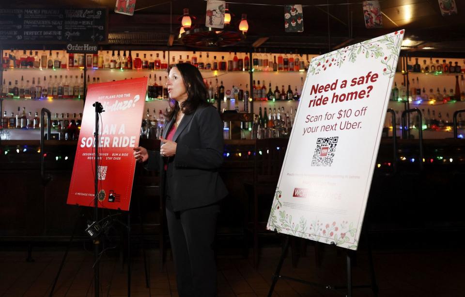 Tiffany Clason, director of Utah Department of Alcoholic Beverage Control, speaks at a press conference urging drivers to add a sober ride to their winter holiday plans at Bar X in Salt Lake City on Thursday.