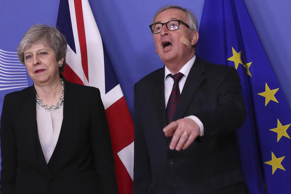 British Prime Minister Theresa May, left, is greeted by European Commission President Jean-Claude Juncker prior to a meeting at EU headquarters in Brussels, Wednesday, Feb. 20, 2019. European Commission President Jean-Claude Juncker and British Prime Minister Theresa May meet Wednesday for their latest negotiating session to seek an elusive breakthrough in Brexit negotiations. (AP Photo/Francisco Seco)