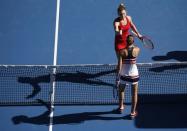 Tennis - Australian Open - Quarterfinals - Rod Laver Arena, Melbourne, Australia, January 24, 2018. Simona Halep of Romania shakes hands with Karolina Pliskova of Czech Republic after Halep won their match. REUTERS/Toru Hanai