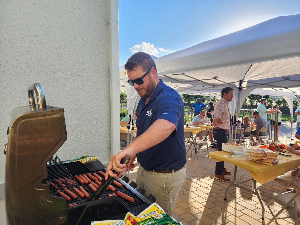 Pulte Homes has set up a place for its employees to get meals, such as this barbecue, and supplies.