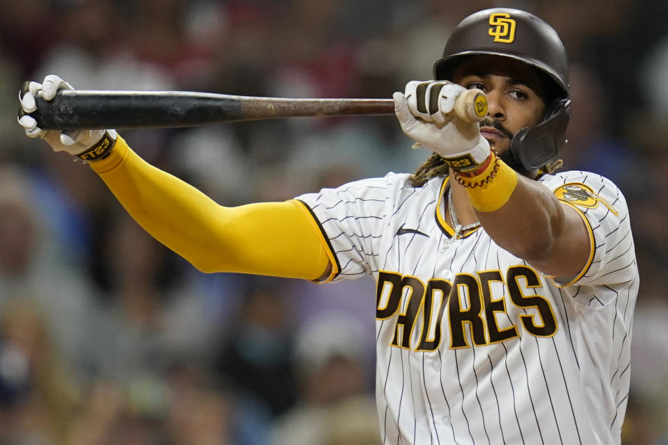 San Diego Padres' Fernando Tatis Jr. reacts as he strikes out while batting during the third inning of the team's baseball game against the Philadelphia Phillies, Friday, Aug. 20, 2021, in San Diego. (AP Photo/Gregory Bull)