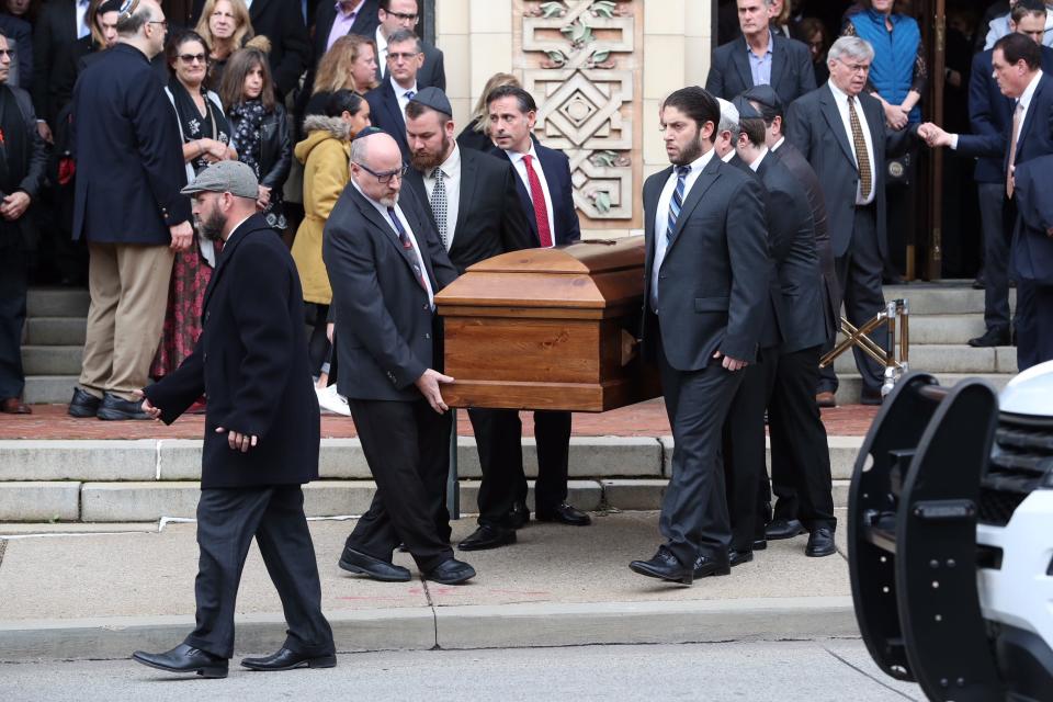 One of the caskets for brothers David and Cecil Rosenthal is carried out of the synagogue at the conclusion of funeral services at the Rodef Shalom Congregation in Pittsburgh, Pa., Tuesday, Oct. 30, 2018. 
