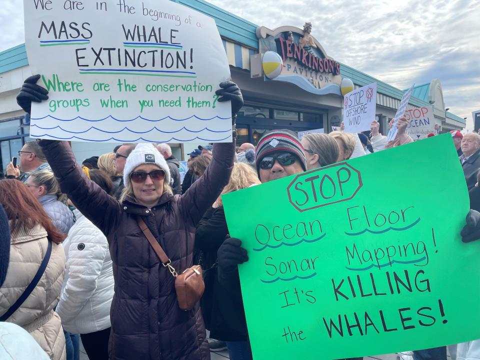 Christine and John Yap of Branchburg join a "Save the Whales" protest in Point Pleasant Beach on Sunday.