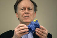 William G. Kaelin Jr. holds a model of his work as he speaks at a news conference, Monday, Oct. 7, 2019, in Boston, after he was awarded the Nobel Prize for Physiology or Medicine. Kaelin, who teaches at Harvard Medical School, shares the prize with Peter J. Ratcliffe and Gregg L. Semenza for their discoveries of how cells sense and adapt to oxygen availability, the Nobel Committee announced Monday. (AP Photo/Elise Amendola)