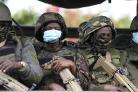 Kenya army soldiers patrol around Nairobi, Kenya Thursday, June 27, 2024. Heavy security was deployed Thursday in Kenya's capital Nairobi ahead of planned protests against a controversial finance bill, despite the president's decision not to sign it after the plans sparked deadly chaos in the capital Tuesday and saw protesters storming and burning part of the parliament building. (AP Photo/Brian Inganga)