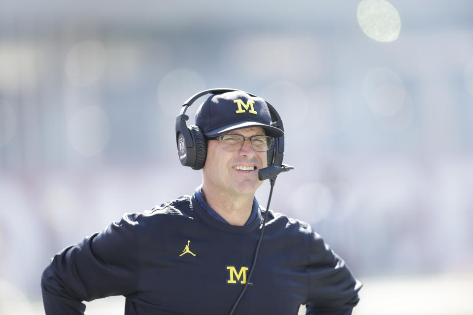 Jim Harbaugh in action during the second half of an NCAA college football game between Michigan and Indiana in Bloomington, Ind., Saturday, Oct. 14, 2017. Michigan won 27-20 in overtime. (AP Photo/AJ Mast)