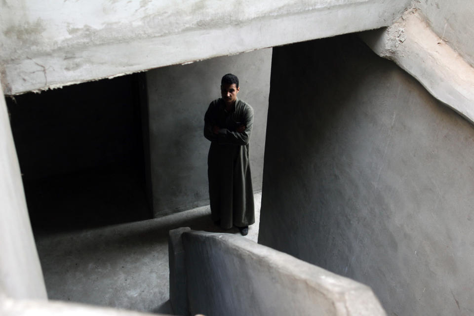 Adel Hanna, a Christian activist, poses for a portrait in Dalga village of Minya, Egypt, Wednesday, Jan. 15, 2014. Through violence or intimidation, Islamists in villages like this one used violence or intimidation to stop Christians from voting "no" to a 2012 constitution that had paved the way for the creation of an Islamic state. This time around, no one is stopping the Christians and they are voting "yes" on a new charter that criminalizes discrimination and instructs the next legislature to ease restrictions on building churches. (AP Photo/Roger Anis, El Shorouk Newspaper) EGYPT OUT