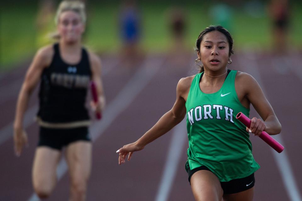 North's Iana Tecson anchors the 4x100 meter relay team to a first place finish during the IHSAA Girls Regional 8 Track & Field Meet at Central Stadium Tuesday evening, May 23, 2023.