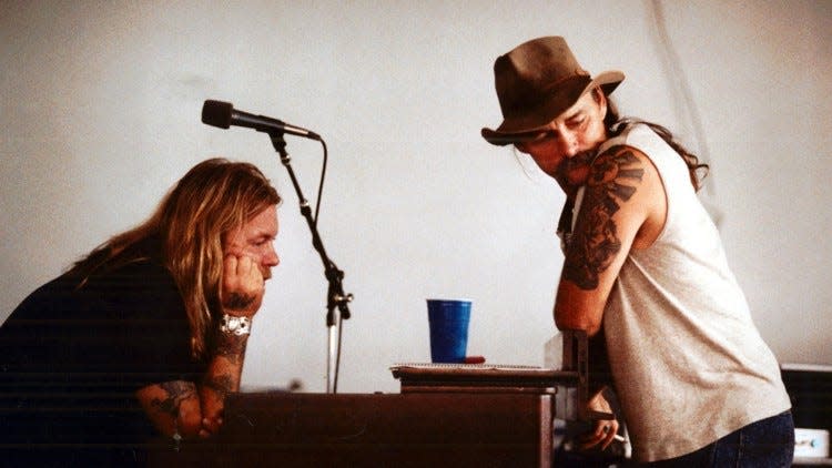 June 24, 1990: Gregg Allman (left) and Dickey Betts were lost in thought during a break in Bradenton where the Allman Brothers Band were practicing in a warehouse in preparation for an upcoming tour.