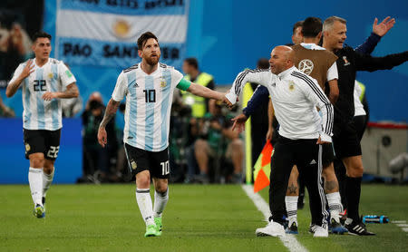 Soccer Football - World Cup - Group D - Nigeria vs Argentina - Saint Petersburg Stadium, Saint Petersburg, Russia - June 26, 2018 Argentina's Lionel Messi celebrates their second goal with coach Jorge Sampaoli REUTERS/Toru Hanai