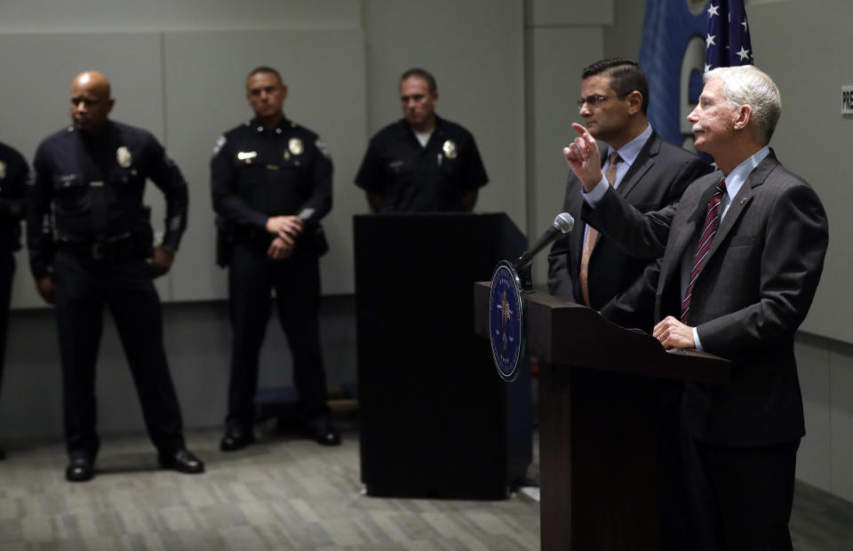 Capt. Billy Hayes fields questions at LAPD headquarters Tuesday, Sept. 25, 2018, in Los Angeles. A man arrested on suspicion of beating a Southern California homeless man into unconsciousness and suspected in six other attacks — three of them fatal — also was being investigated in the disappearances of two of the suspect's Texas relatives, officials said Tuesday. (AP Photo/Marcio Jose Sanchez)