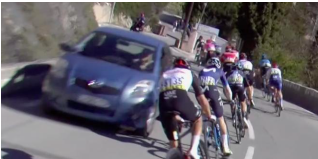 Racers Endangered During Final Stage of Paris Nice When Random Car