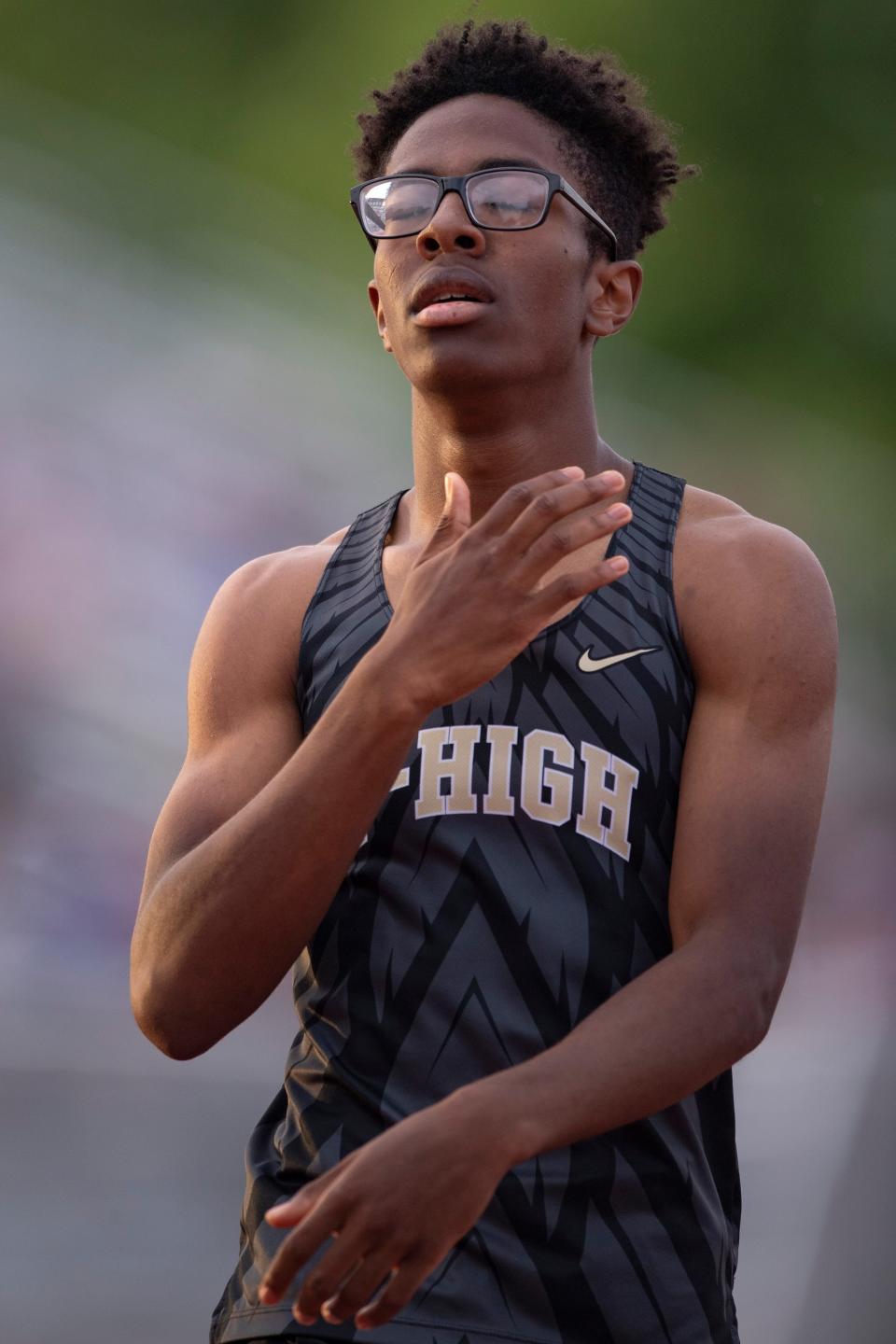 Topeka High's V’Ante Peoples reacts after competing in the 200 meter dash during 6A regionals Thursday at Hummer Sports Park.