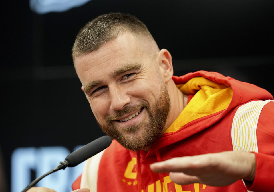 Kansas City Chiefs tight end Travis Kelce reacts when being asked about Taylor Swift in Frankfurt, Germany, Friday, Nov. 3, 2023. The Kansas City Chiefs are set to play the Miami Dolphins in a NFL game in Frankfurt on Sunday Nov. 5, 2023. (AP Photo/Michael Probst)