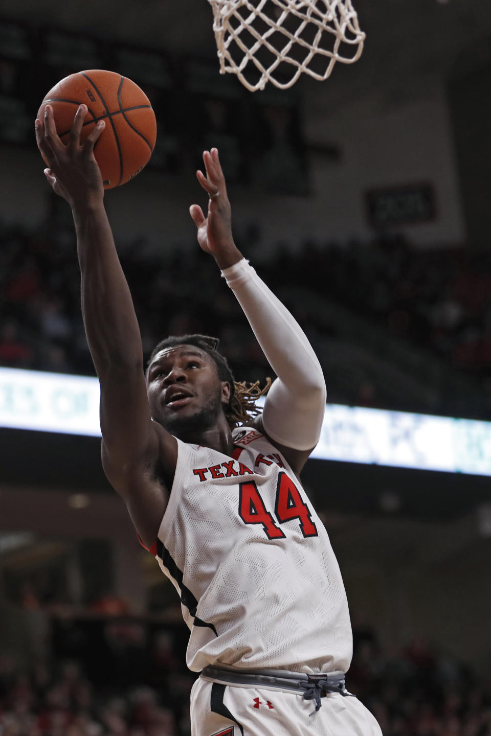 Texas Tech's Chris Clarke (44) lays up the ball during the first half of an NCAA college basketball game against Cal State Bakersfield, Sunday, Dec. 29, 2019, in Lubbock, Texas. (AP Photo/Brad Tollefson)