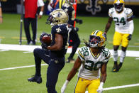 New Orleans Saints wide receiver Emmanuel Sanders (17) pulls in a touchdown reception over Green Bay Packers cornerback Kevin King (20) in the first half of an NFL football game in New Orleans, Sunday, Sept. 27, 2020. (AP Photo/Butch Dill)