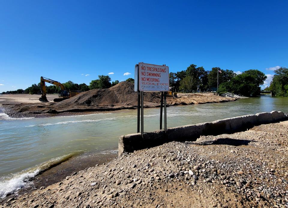 Signage alerts passers-by of rules at the mouth of the Black River Canal on Thursday, Aug. 31, 2023.