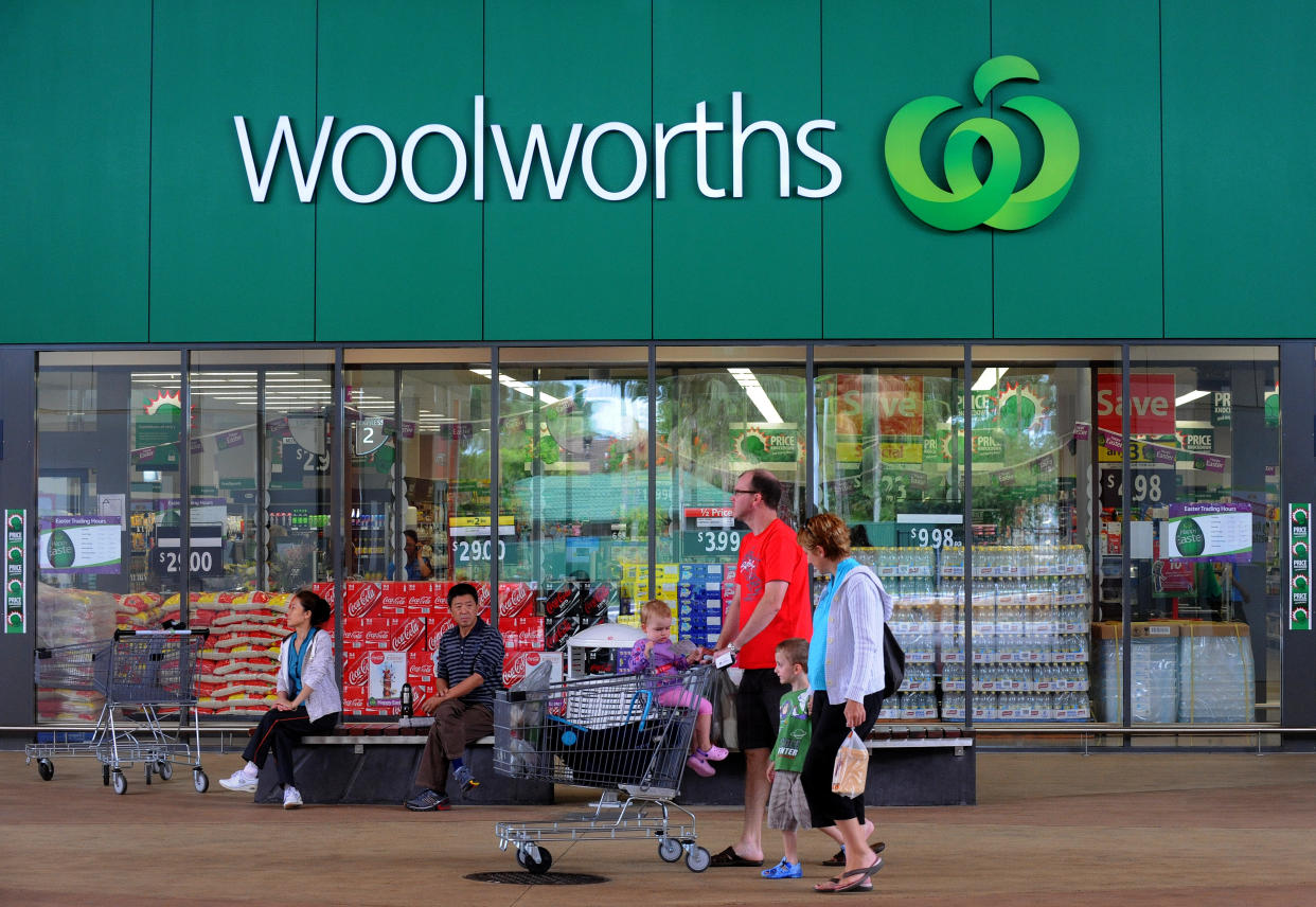 Shoppers outside a Woolworths grocery store in Brisbane, Tuesday, April 19, 2011. 