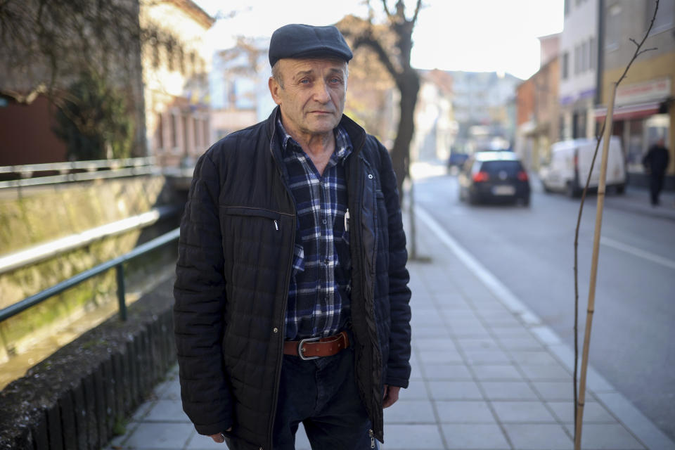 Wartime inventor and engineer Murat Heto poses for a photo after an interview with Associated Press in Gorazde, Bosnia, Monday, Dec. 19, 2022. To survive and keep the lights on in their besieged town - cut off throughout Bosnia's 1992-95 interethnic war from access to electricity grid, food, medicine and the outside world - the people of Gorazde had to come up with various creative inventions. (AP Photo/Armin Durgut)