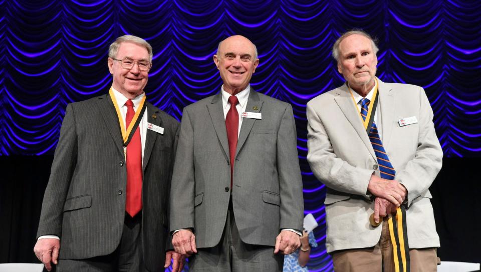 Joe Gaddis, center, Oak Ridge High School athletic director and longtime football coach, now retired, was inducted into the TSSAA Hall of Fame at Middle Tennessee State University on Monday, April 8, 2024. Gaddis received his Hall of Fame plaque from Mike Reed, left, TSSAA Board of Control chairman. Oak Ridger Earl Nall, right, a TSSAA Hall of Fame 2006 inductee, presented the TSSAA Hall of Fame medallion at the ceremony.