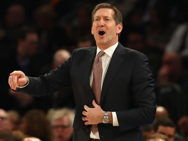 Jeff Hornacek yells at 2018 addition John Salley to come meet the entry pass. (Getty Images)