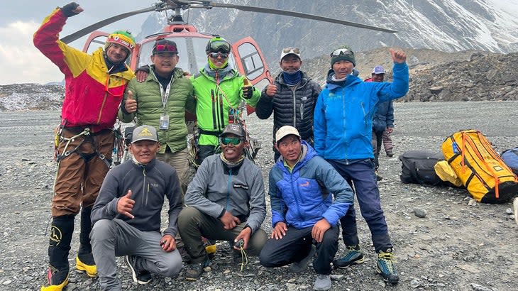<span class="article__caption">The team of rescuers celebrates the successful mission at Annapurna Base Camp. </span> (Photo: Sobit Gauchan)
