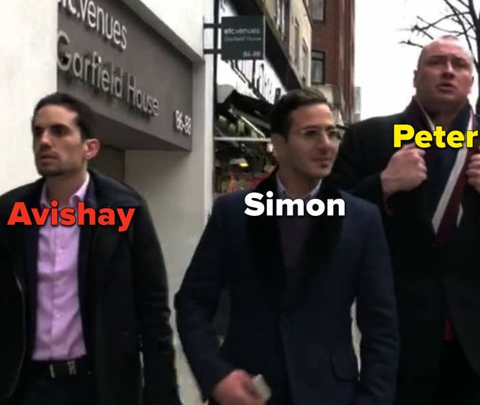 Simon walks with his bodyguard, Peter, and Avishay, his business partner