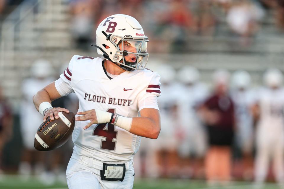 Flour Bluff's Jayden Paluseo looks to pass during the game at Phil Danaher Stadium on Friday, Sept. 8, 2023, in Corpus Christi, Texas.