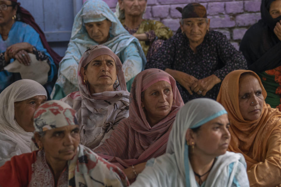 Relatives and neighbors of Waseem Sarvar Bhat, an Indian army solider who was killed in a gunfight with suspected rebels, grieve at his residence in Bandipora, north of Srinagar, Indian controlled Kashmir, Saturday, Aug. 5, 2023. Three Indian soldiers were killed in a gunbattle with rebels fighting against New Delhi's rule in Kashmir, officials said Saturday, as authorities stepped up security on the fourth anniversary since India revoked the disputed region's special status. (AP Photo/Dar Yasin)