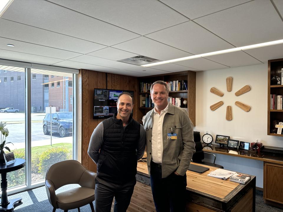 Walmart CEO Doug McMillon (right) shares his views on the retailer and economy from inside his office in Bentonville, Arkansas with Yahoo Finance executive editor Brian Sozzi (left).